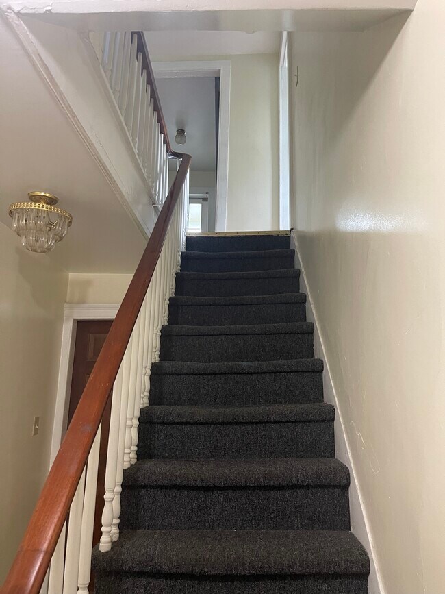 Staircase leading up to apartment - 39 Upper Croton Ave