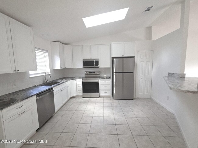 Building Photo - 6580 Floridana Ave