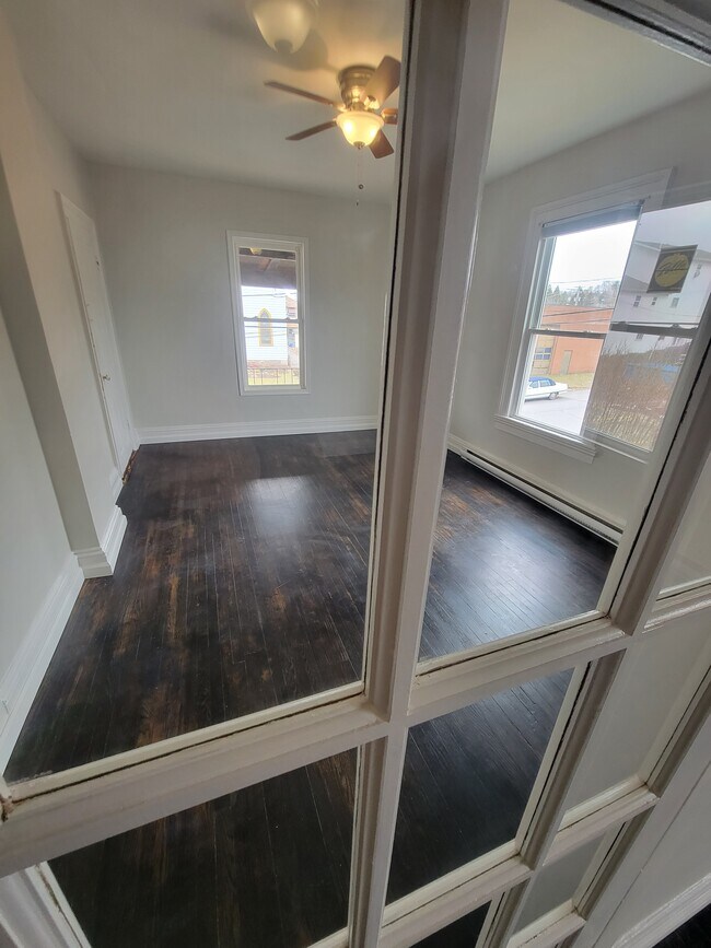 Living room with French doors - 1016 Wood St