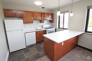 Building Photo - Purchase Place Apartments