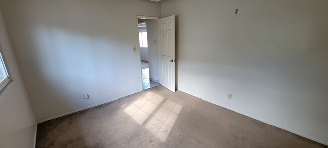 NOTE: Bedroom flooring will be new Wood LVP. Room dimensions are 11'10" x 10'4" - 512 S Flower St
