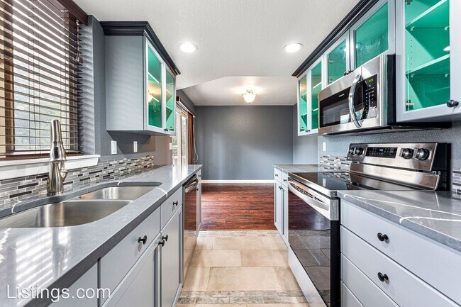 Foto del edificio - 4 br, 3.5 bath House - 9593 E Louisiana Pl