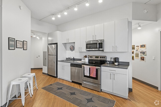 3BR, 2BA - 1,276SF - Kitchen - Arc at Old Colony Apartments