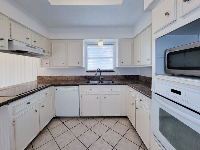Building Photo - Come and view this open floor plan with much potential. Formal and dining room, granite counters,...
