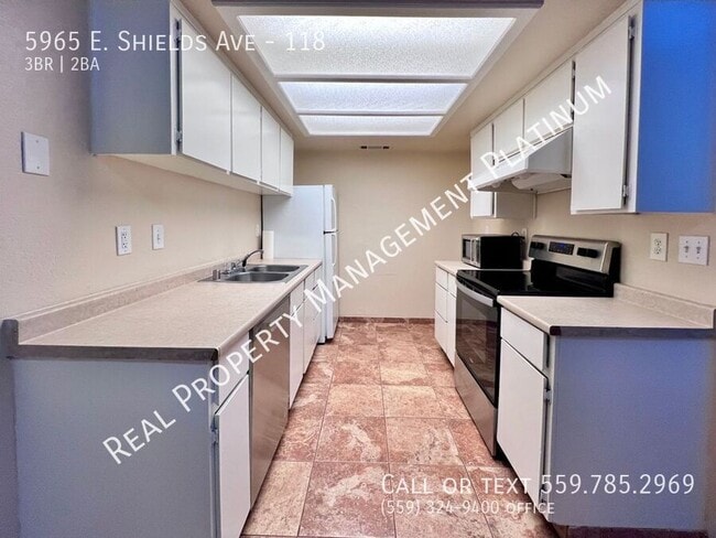 Foto del edificio - 5965 E Shields Ave