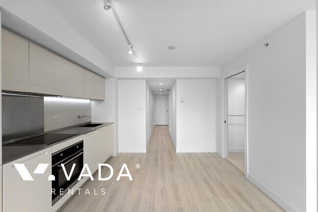 Photo du bâtiment - Addition Living 1 BR APT Rental 1503-1133 Hornby St Vancouver: VADA