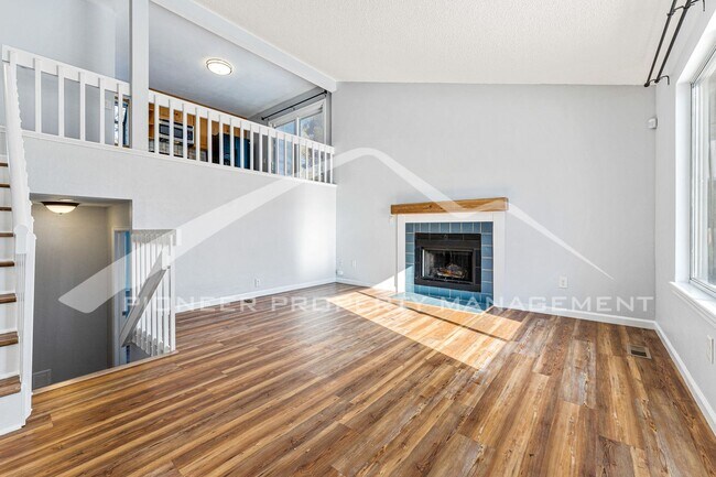 Building Photo - Beautiful Home with Fenced Back Yard and A...