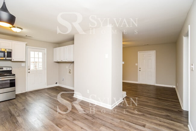 Building Photo - You'll love this charming brick home!