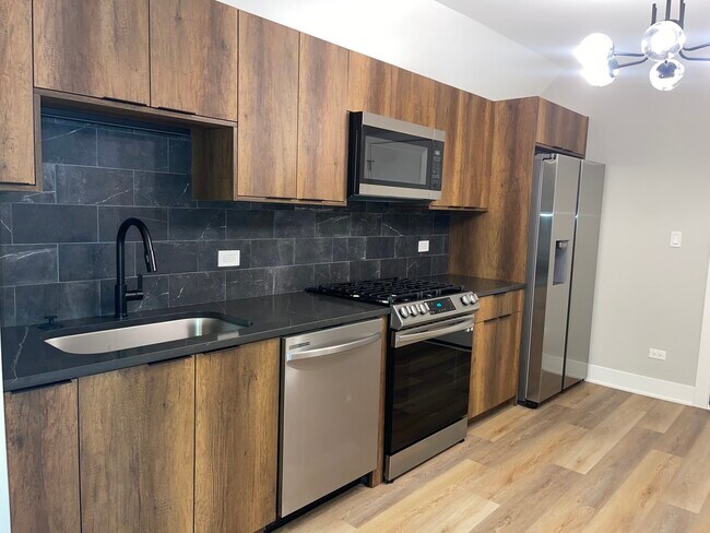 Foto del edificio - 3035 N Kilpatrick Ave