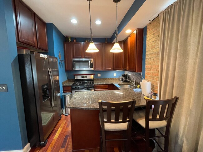 Foto del edificio - 6414 N Hoyne Ave