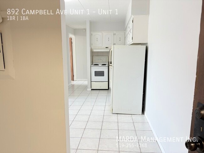 Photo du bâtiment - COZY 1 BED/1 BATH MAIN FLOOR UNIT -WALKING DISTANCE TO U OF W + HYDRO!