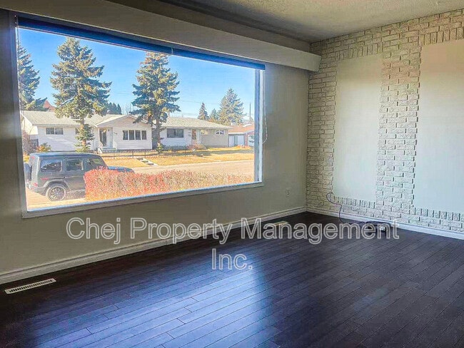 Building Photo - 13411-13461 61 St NW