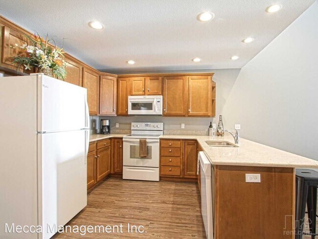 Building Photo - 7128-7128 Triumph Ln