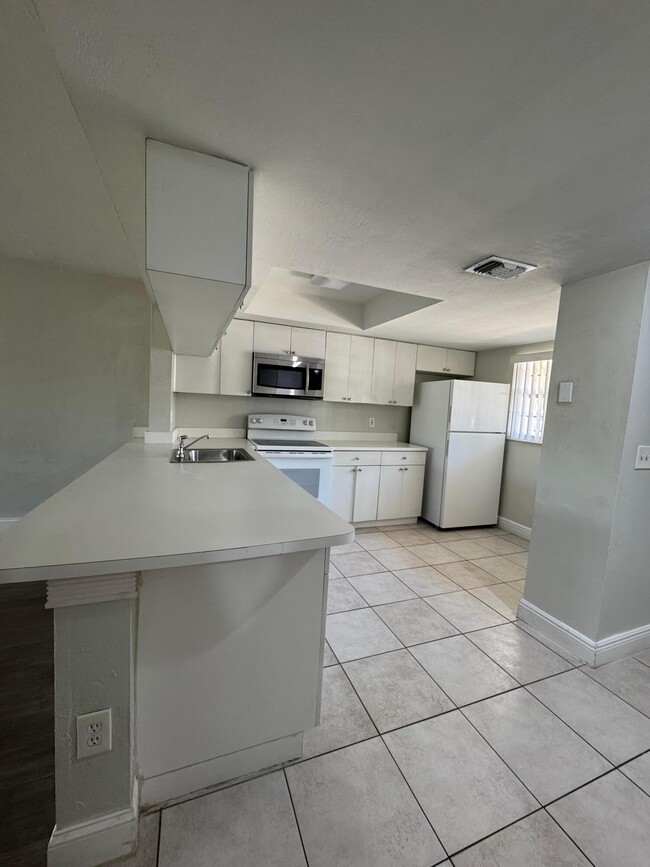 Foto del edificio - 803 Palm Beach Trace Dr