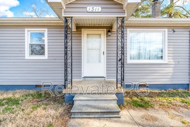 Building Photo - 1311 Miles Ave