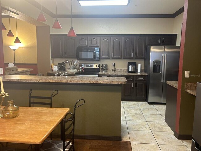 Building Photo - 5009 Sunridge Palms Dr