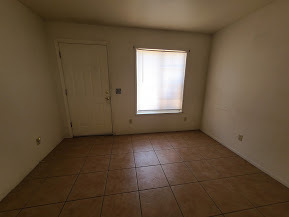Building Photo - Open , bright, airy all tile unit