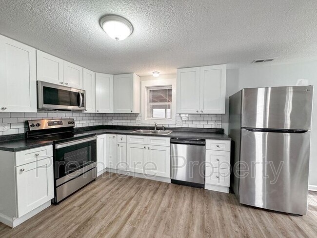 Foto del edificio - 15400 E 54th St