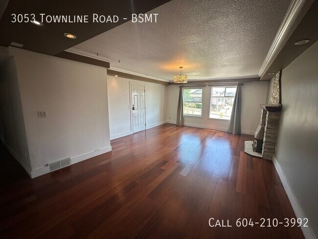 Photo du bâtiment - 2 Bedroom Basement Suite – Utilities Included