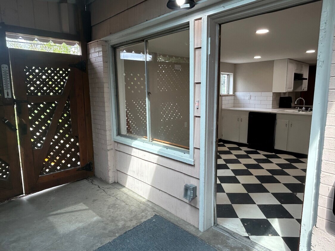 Front door and gate - 5590 W 1st Ave