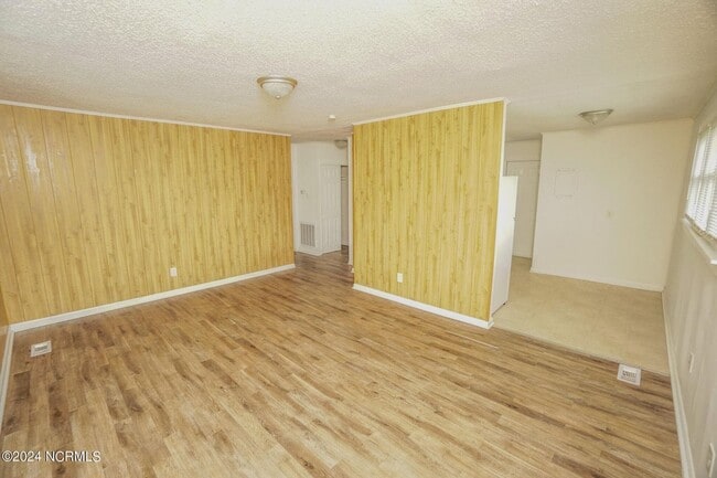 Building Photo - Lawn Care Included in Jville City Limits!