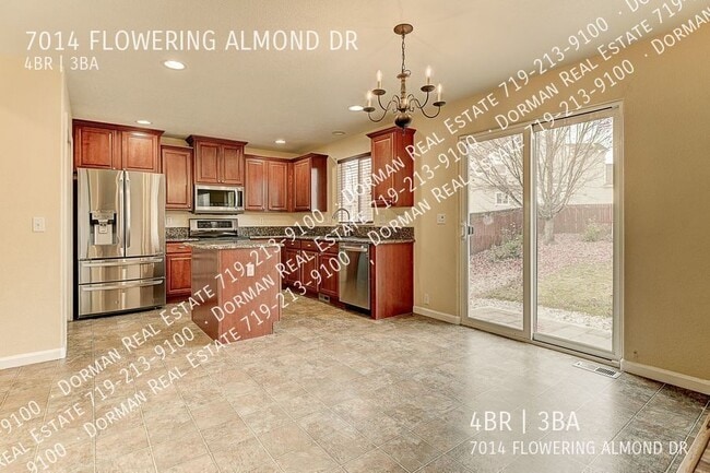 Foto del edificio - 7014 Flowering Almond Dr