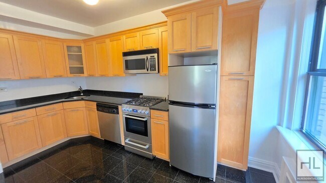 Building Photo - Oversized 3rd-Floor Studio with a Separate Windowed Kitchen in the West Village