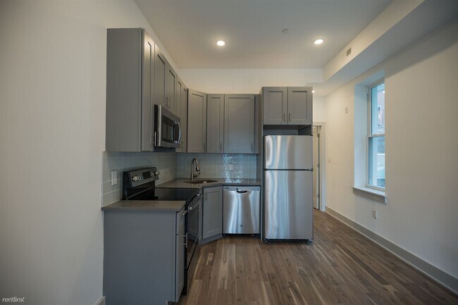 Foto del edificio - 3 br, 2 bath 4plex - 3213 HAVERFORD AVE Un...