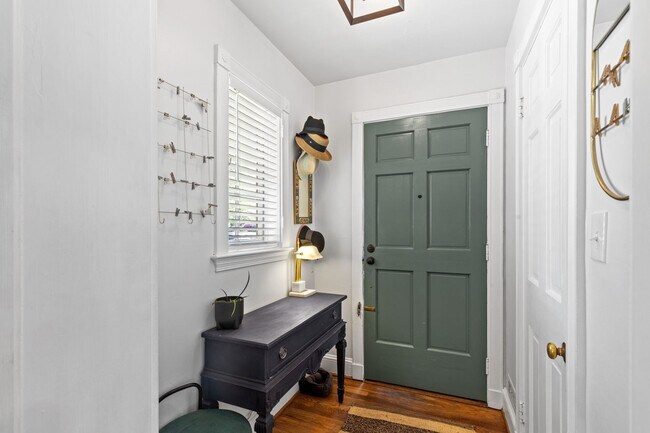 Building Photo - Luxurious Brick Colonial in Prestigious Gu...