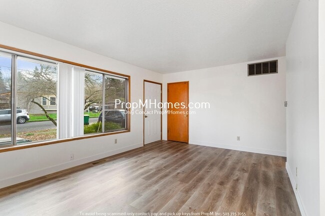 Building Photo - Charming Two Bedroom Duplex in Vose Neighborhood - Corner Lot!