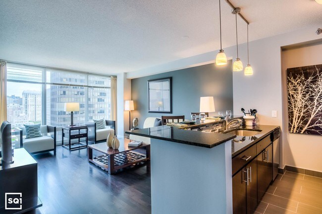 Building Photo - STREETERVILLE: Roof deck and in-unit W/D