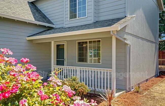 Building Photo - 332 NE Carmen Pl