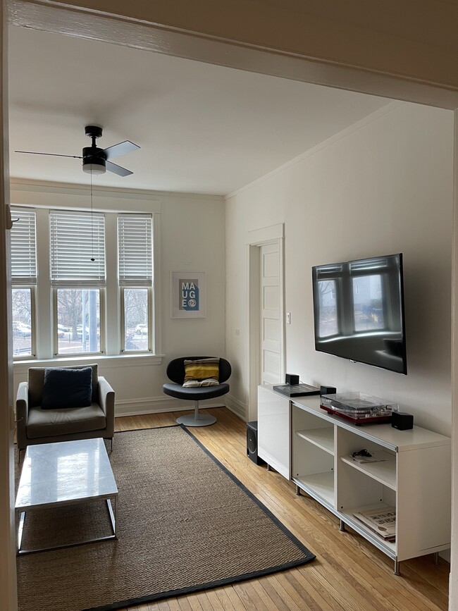 Apartment comes with a tv, stereo, and console cabinet. - 3489 N Elston Ave