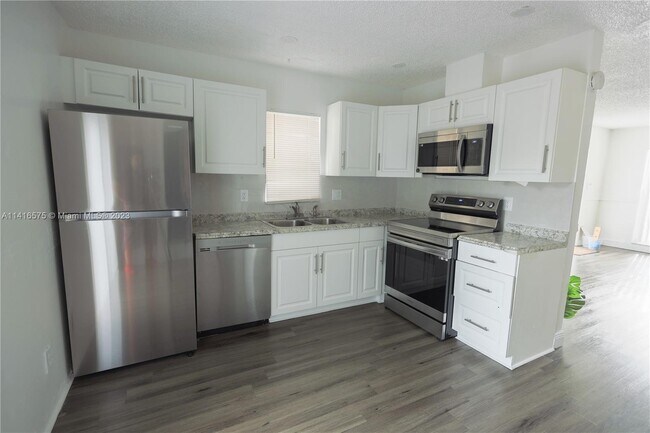Foto del edificio - 1121-1123 N Andrews Ave