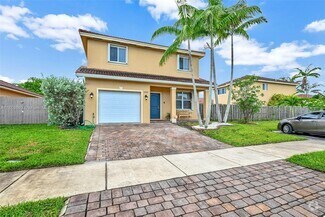 Building Photo - 8986 SW 214th Terrace