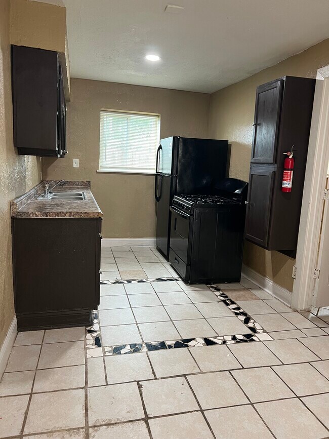 Kitchen and Appliances - 7605 Denton St
