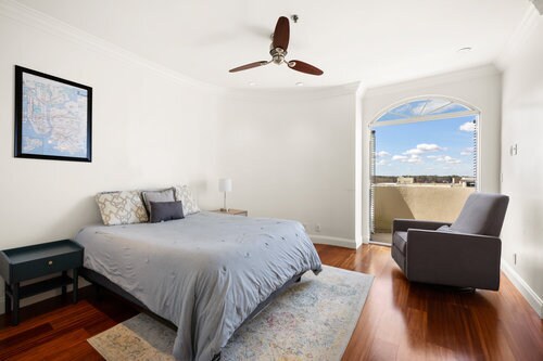 Bedroom 1 features french door balcony with skyline views - 2161 Peachtree Rd NE