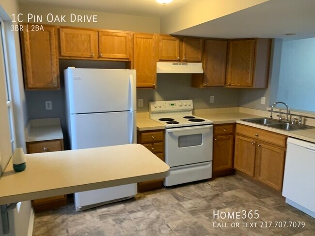 Building Photo - 3 Bed 2 Full Bath Townhome home with Garage!
