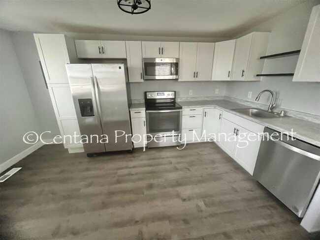 Building Photo - This remodeled two bedroom has all new everything including high end stainless steel appliances.