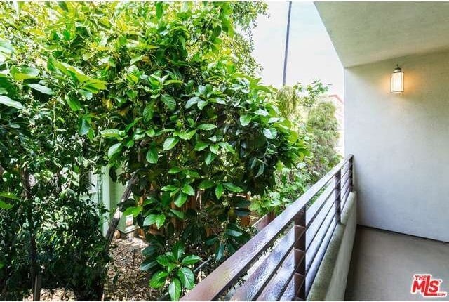 Balcony off living room with light - 1951 N Beachwood Dr