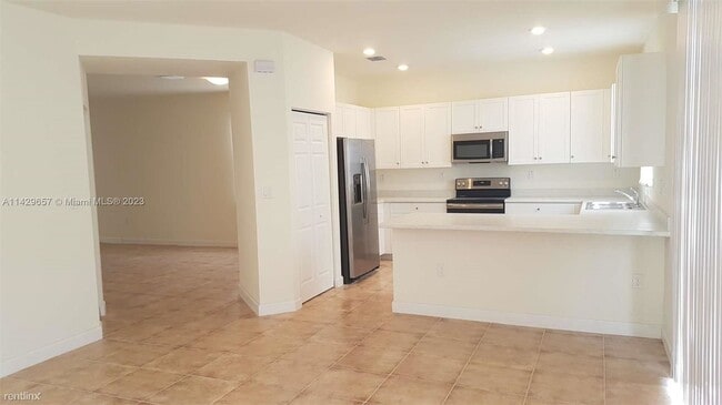 Building Photo - 4 br, 3 bath House - 10554 W 35th Ln