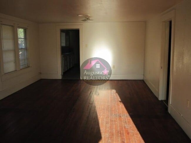 Building Photo - Three