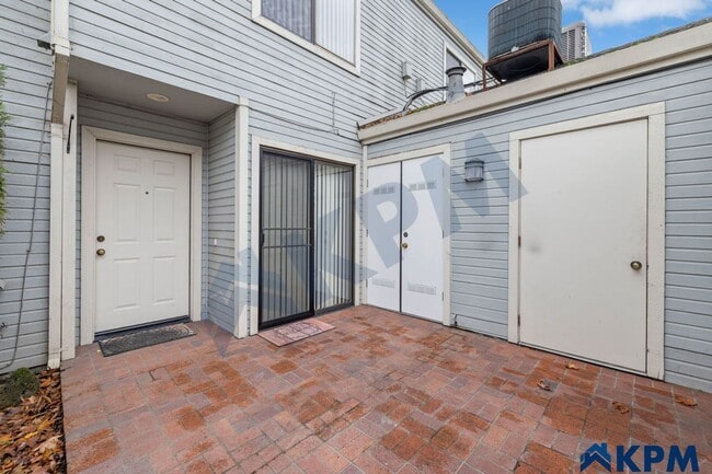 Building Photo - Gated 2-Story 2 Bedroom 2.5 Bath Townhome ...