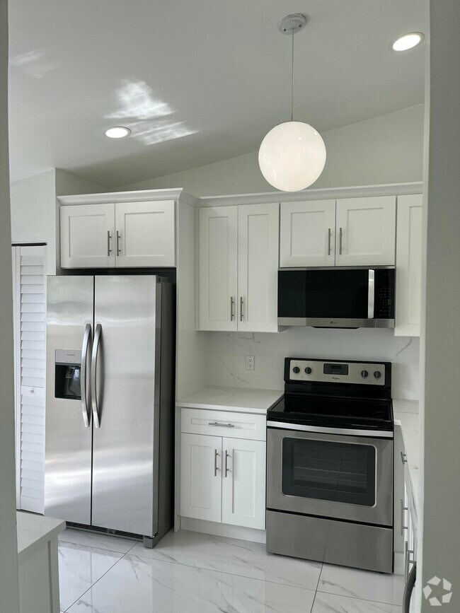 Building Photo - 10212 Boca Bend E
