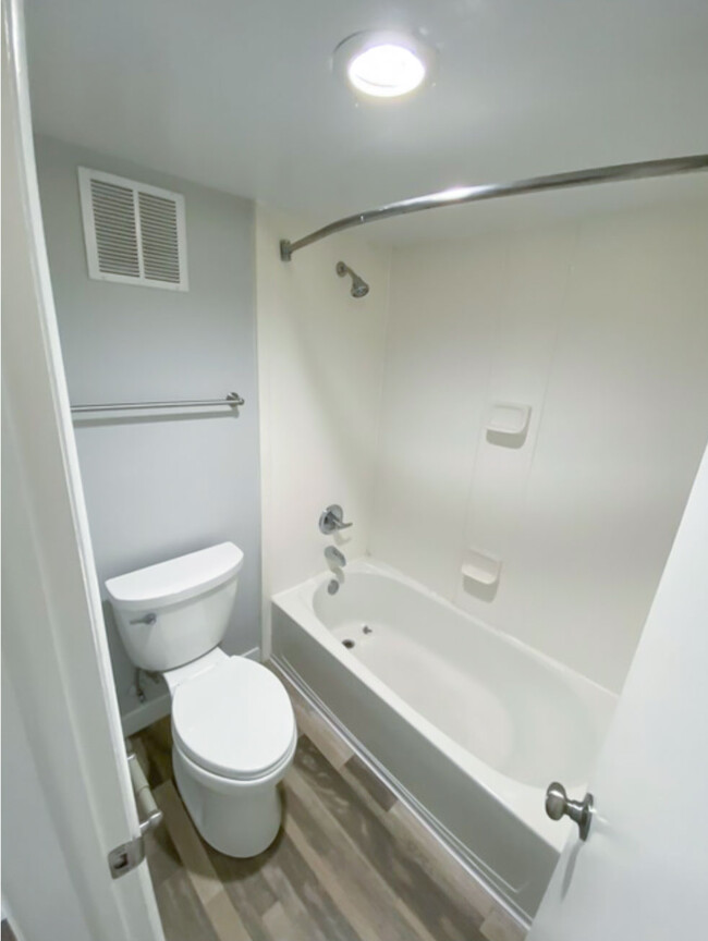 Fully Renovated Bathrooms with New Toilets, Showers, Bathtubs, Floors, and Paint - Kiptopeke Studios