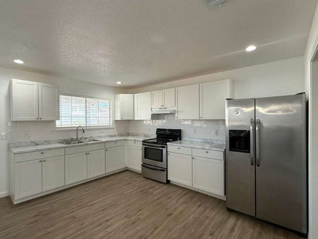 Photo - 9339 Mimosa Manor House