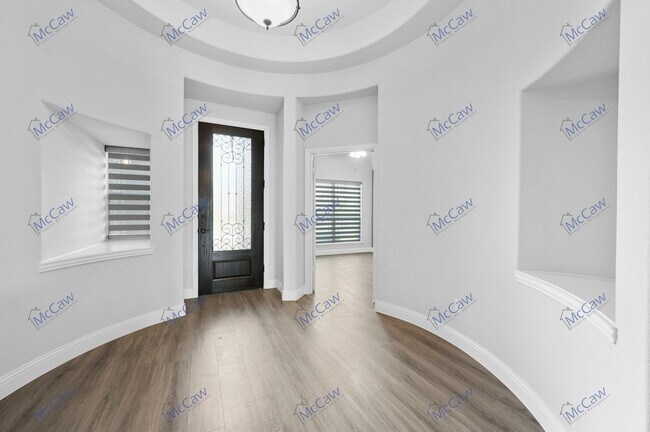 Building Photo - 4/3/3 Car Garage with a gorgeous outdoor s...