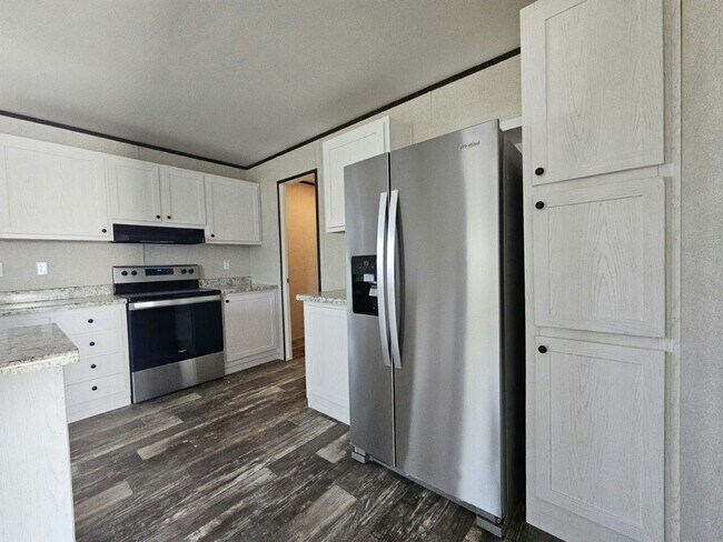 Building Photo - 6591 Hidden Oaks Dr