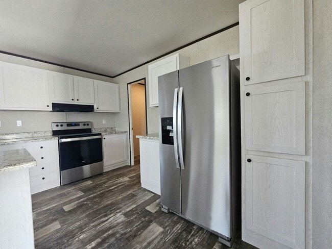 Foto del edificio - 6591 Hidden Oaks Dr