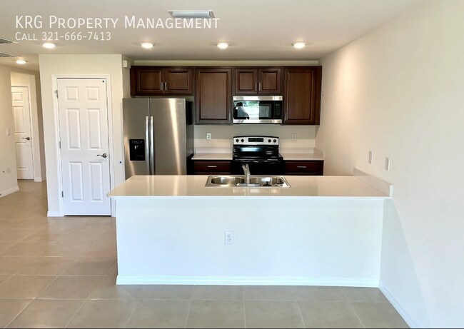 Foto del edificio - 7009 Blue Cypress Way